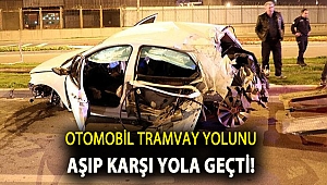 Otomobil tramvay yolunu aşıp karşı yola geçti!