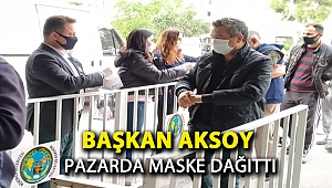 Başkan Aksoy pazarda maske dağıttı