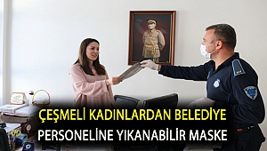Çeşmeli kadınlardan belediye personeline yıkanabilir maske