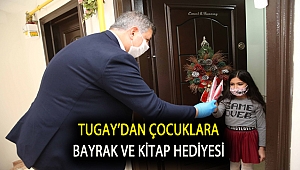 Tugay’dan çocuklara bayrak ve kitap hediyesi