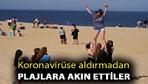 Koronavirüse aldırmadan plajlara akın ettiler