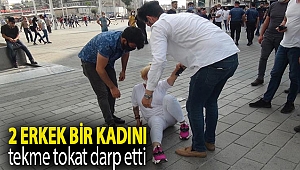 Taksim’de 2 erkek bir kadını tekme tokat darp etti