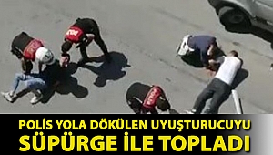 Polis yola dökülen uyuşturucuyu süpürge ile topladı